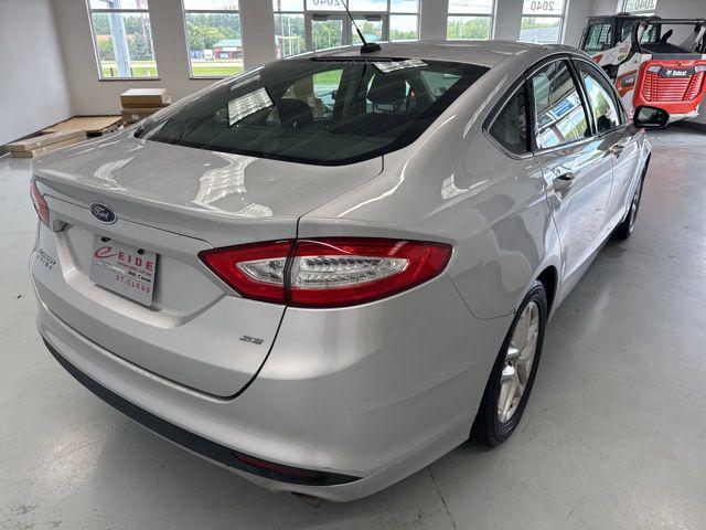 used 2016 Ford Fusion car, priced at $6,000