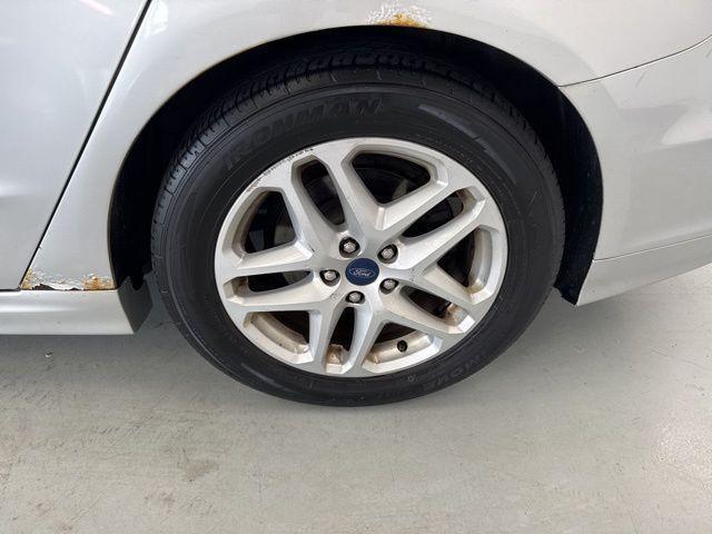 used 2016 Ford Fusion car, priced at $6,000