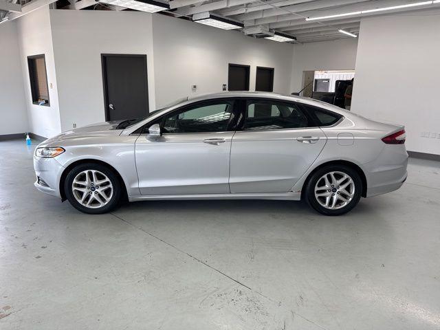 used 2016 Ford Fusion car, priced at $6,000