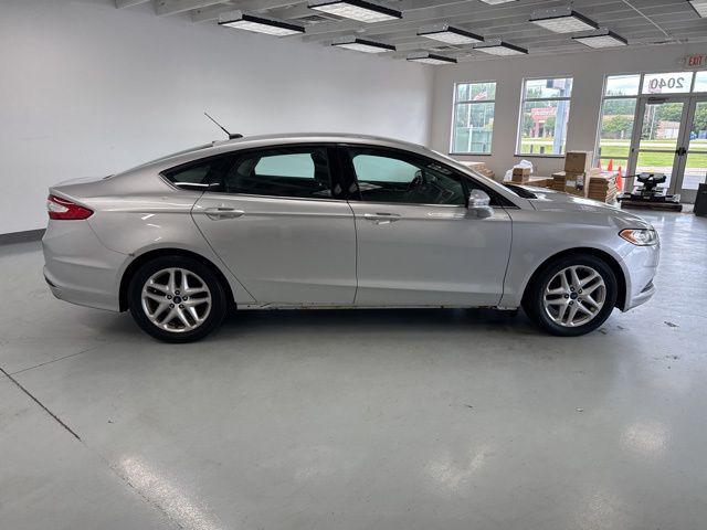 used 2016 Ford Fusion car, priced at $6,000
