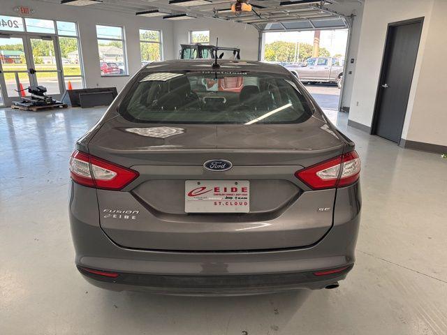 used 2014 Ford Fusion car, priced at $5,500