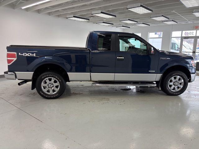 used 2013 Ford F-150 car, priced at $15,000