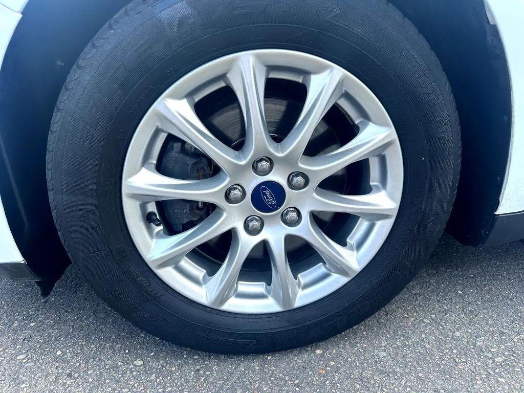 used 2016 Ford Fusion car, priced at $12,995