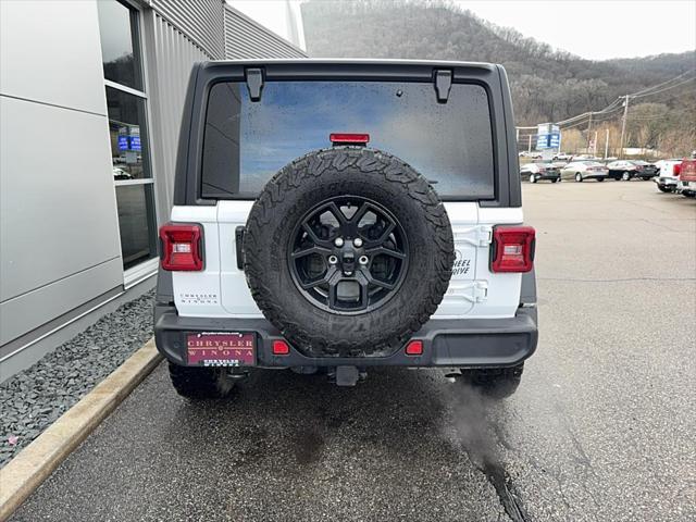 used 2024 Jeep Wrangler car, priced at $42,890