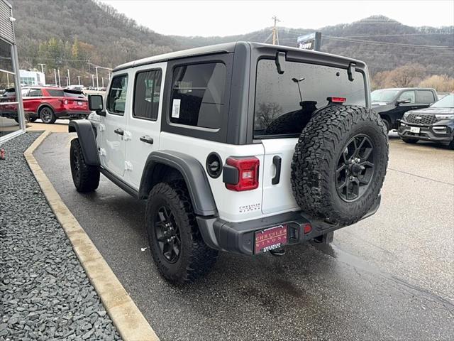 used 2024 Jeep Wrangler car, priced at $42,890