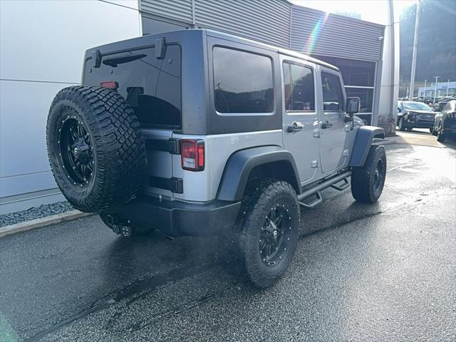 used 2015 Jeep Wrangler Unlimited car, priced at $19,990