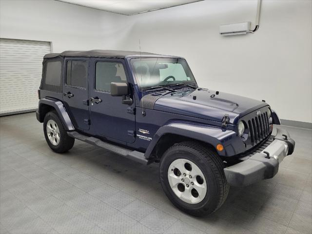 used 2013 Jeep Wrangler Unlimited car, priced at $18,695