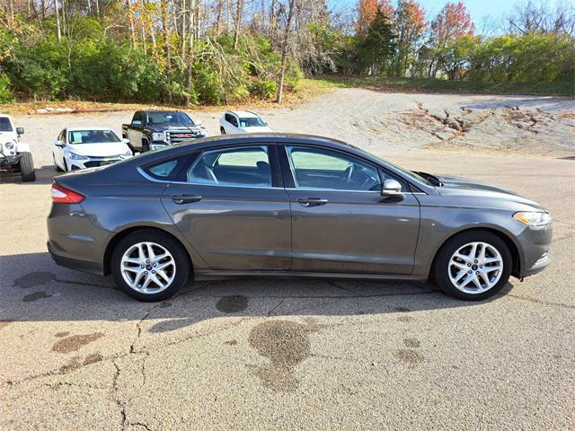 used 2016 Ford Fusion car, priced at $3,475
