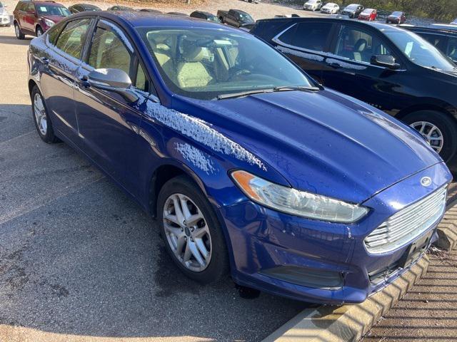 used 2014 Ford Fusion car, priced at $5,775