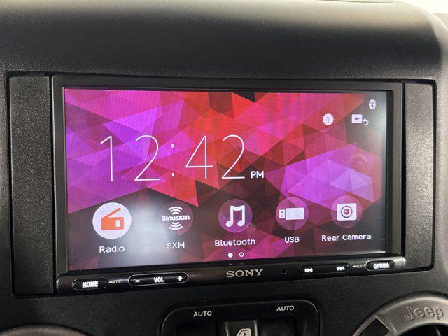 used 2016 Jeep Wrangler Unlimited car, priced at $16,430