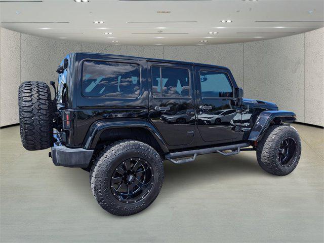 used 2017 Jeep Wrangler Unlimited car, priced at $28,991
