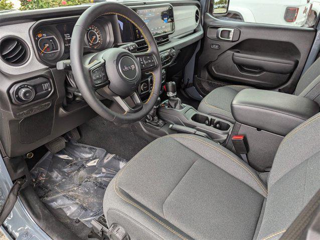 used 2024 Jeep Wrangler car, priced at $33,851