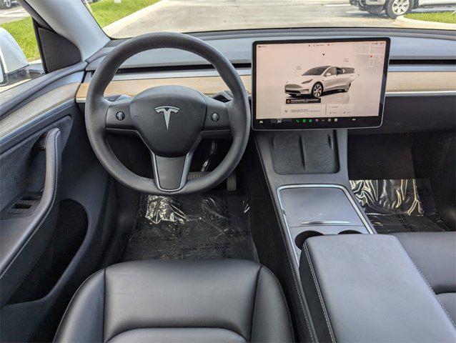 used 2024 Tesla Model Y car, priced at $35,631