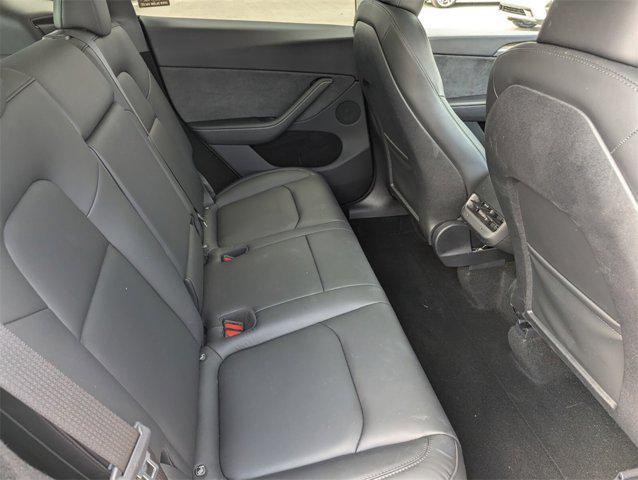 used 2024 Tesla Model Y car, priced at $35,631