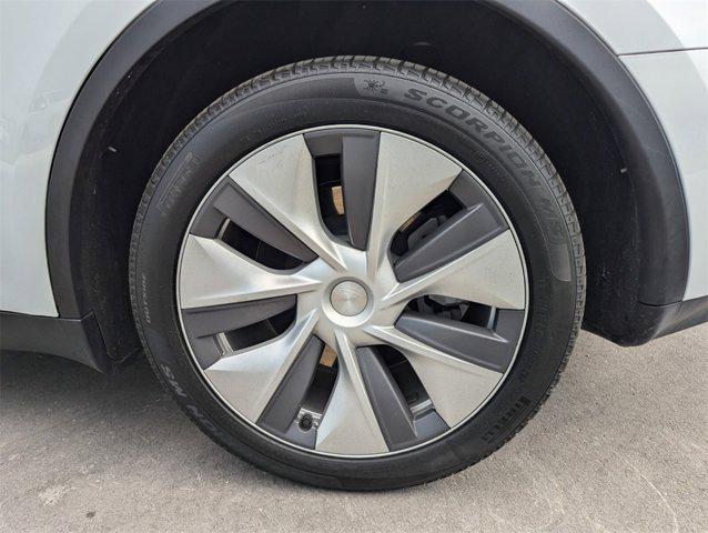 used 2024 Tesla Model Y car, priced at $35,631