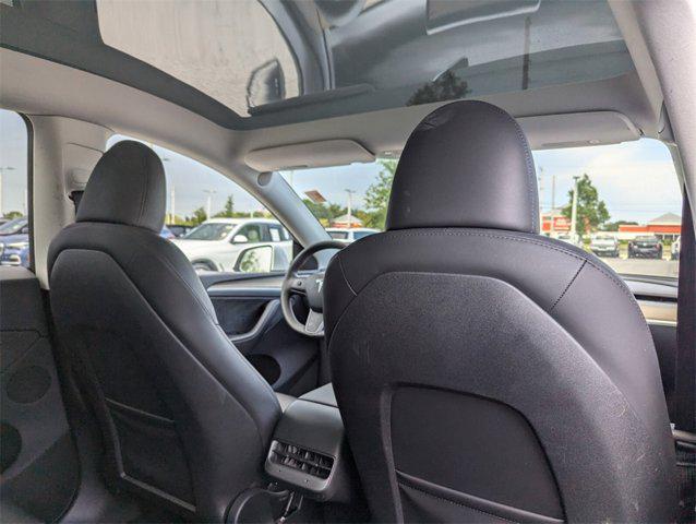 used 2024 Tesla Model Y car, priced at $35,631