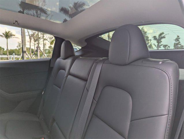 used 2024 Tesla Model Y car, priced at $35,631