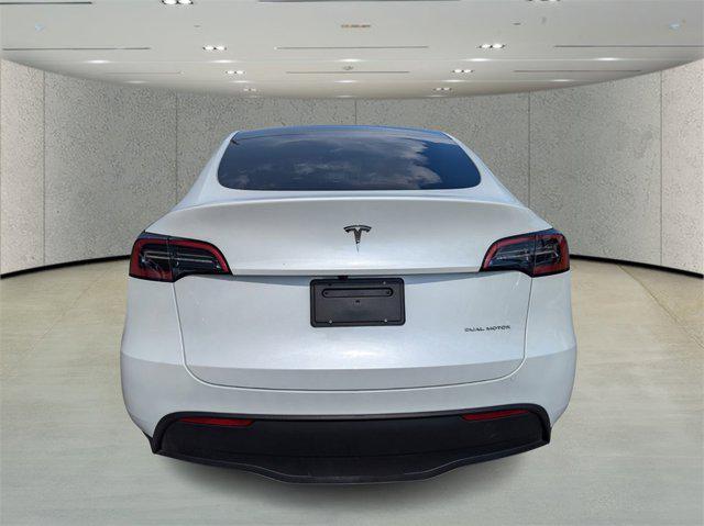 used 2024 Tesla Model Y car, priced at $35,631