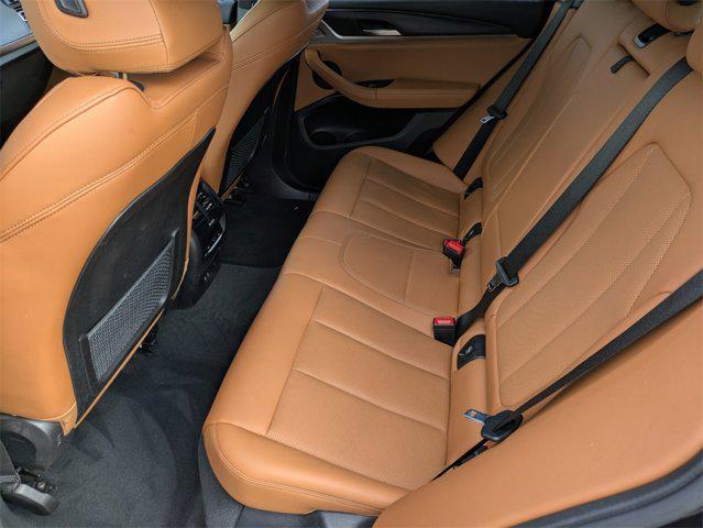 used 2022 BMW X4 car, priced at $40,971