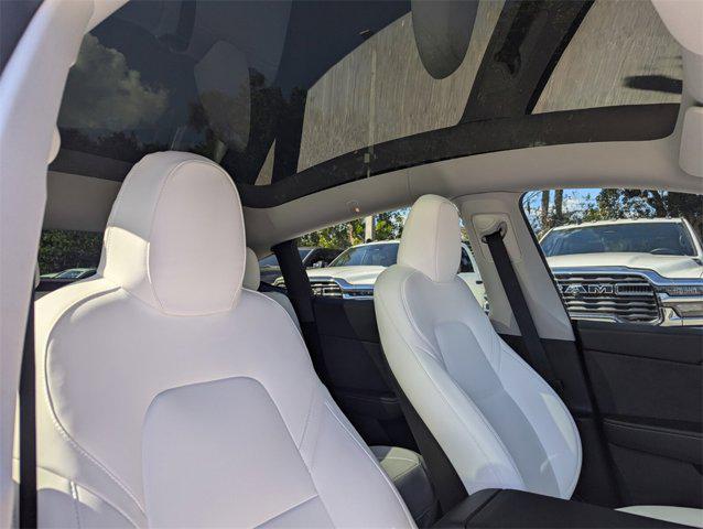 used 2024 Tesla Model Y car, priced at $35,991