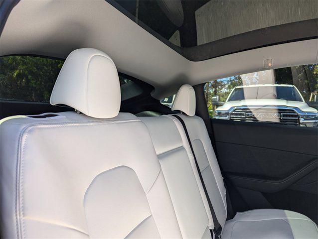 used 2024 Tesla Model Y car, priced at $35,991