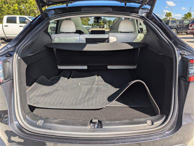 used 2024 Tesla Model Y car, priced at $35,991
