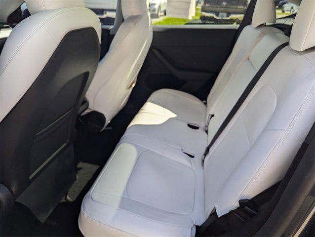 used 2024 Tesla Model Y car, priced at $35,991