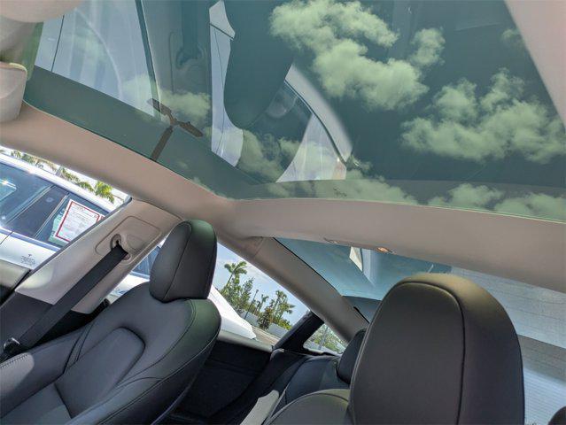 used 2023 Tesla Model 3 car, priced at $32,451
