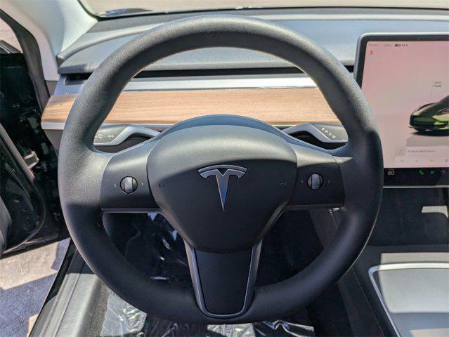 used 2023 Tesla Model 3 car, priced at $32,451