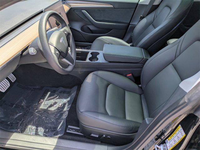 used 2023 Tesla Model 3 car, priced at $32,451