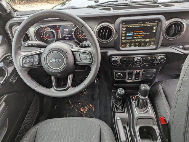 used 2023 Jeep Wrangler car, priced at $29,822