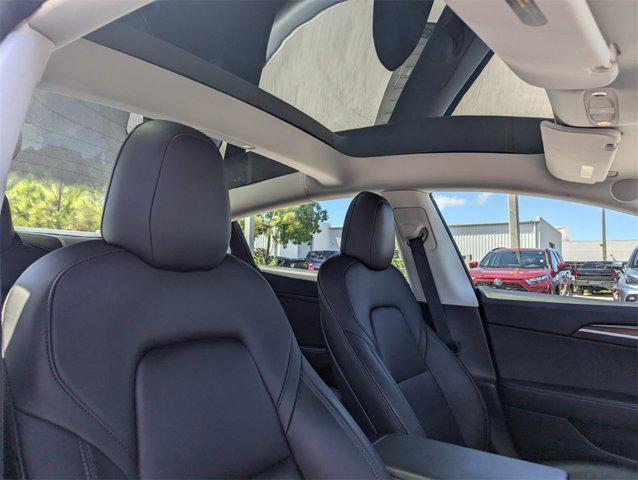 used 2022 Tesla Model 3 car, priced at $27,672
