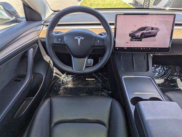 used 2022 Tesla Model 3 car, priced at $27,672
