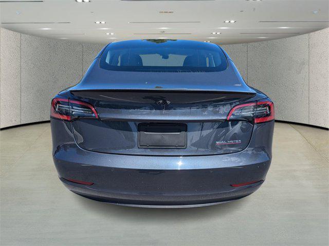 used 2022 Tesla Model 3 car, priced at $27,672