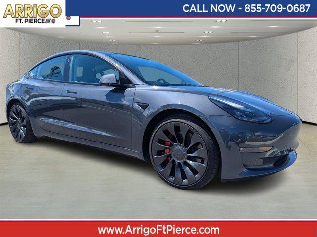 used 2022 Tesla Model 3 car, priced at $27,672