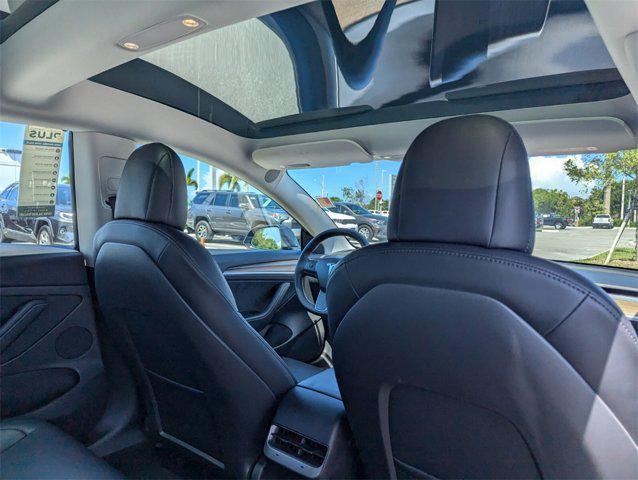 used 2022 Tesla Model 3 car, priced at $27,672