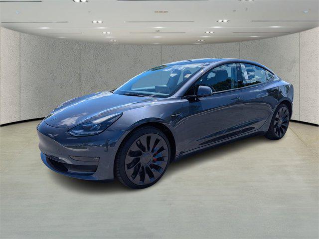 used 2022 Tesla Model 3 car, priced at $27,672
