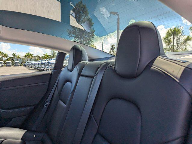 used 2022 Tesla Model 3 car, priced at $27,672