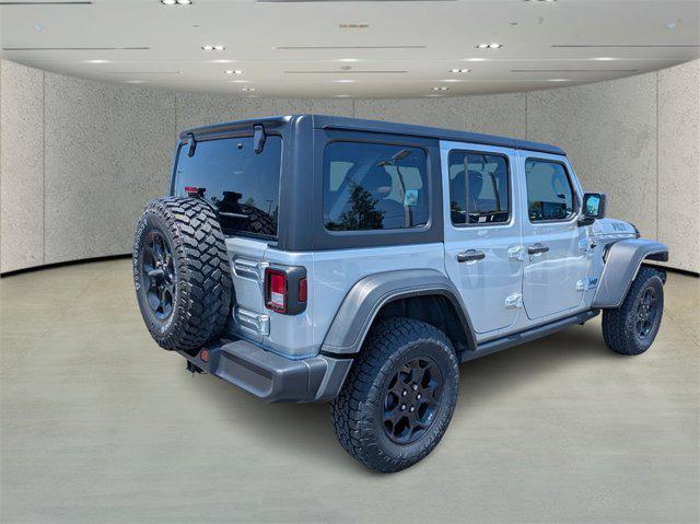 used 2023 Jeep Wrangler 4xe car, priced at $29,121