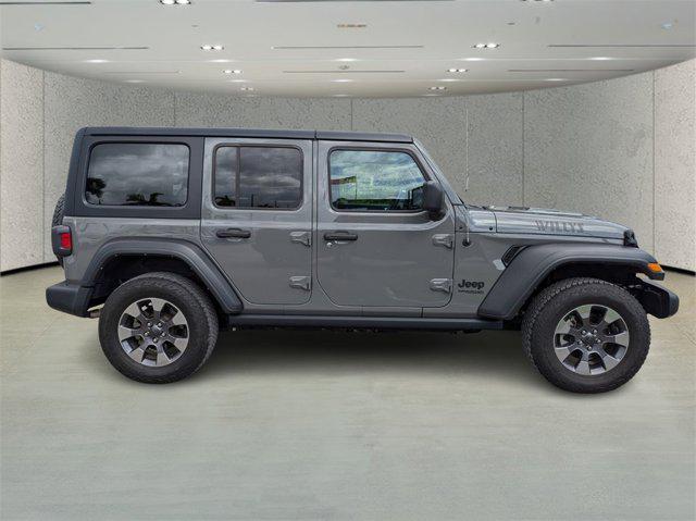 used 2021 Jeep Wrangler Unlimited car, priced at $29,991