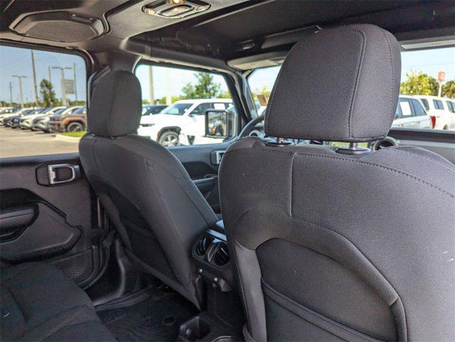 used 2023 Jeep Wrangler car, priced at $33,852