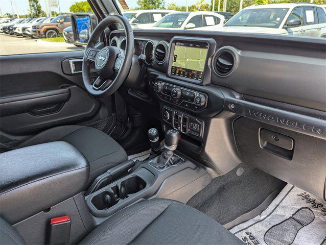 used 2023 Jeep Wrangler car, priced at $33,852