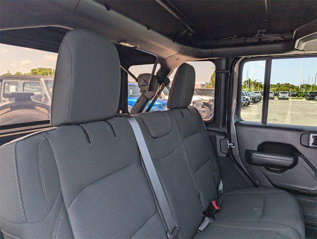 used 2023 Jeep Wrangler car, priced at $33,852