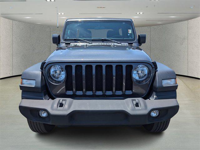 used 2023 Jeep Wrangler car, priced at $33,852