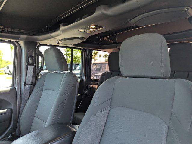 used 2023 Jeep Wrangler car, priced at $33,852
