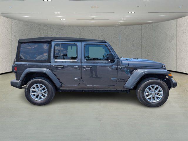 used 2023 Jeep Wrangler car, priced at $33,852