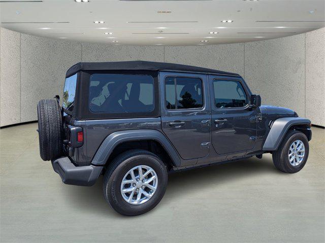 used 2023 Jeep Wrangler car, priced at $33,852