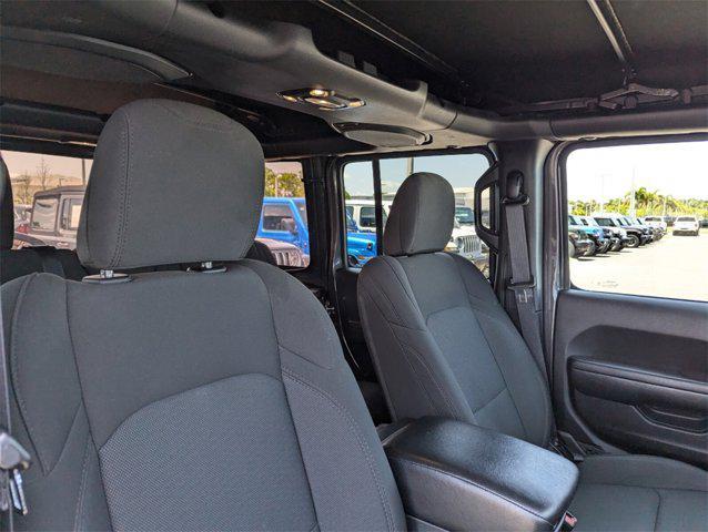 used 2023 Jeep Wrangler car, priced at $33,852