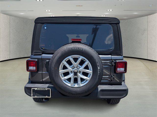 used 2023 Jeep Wrangler car, priced at $33,852
