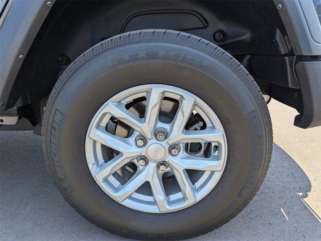 used 2023 Jeep Wrangler car, priced at $33,852